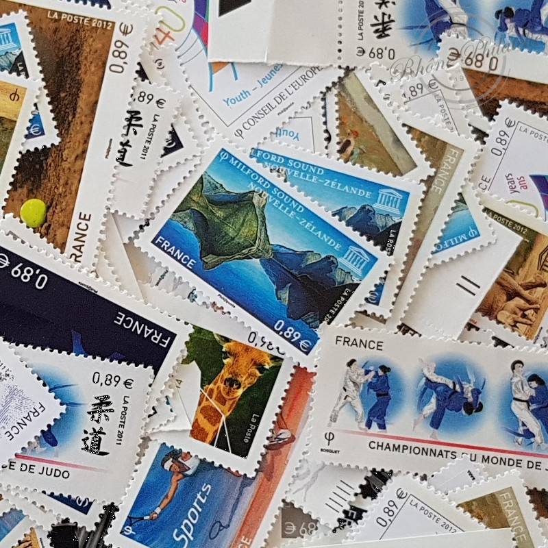 LOT DE 100 TIMBRES-POSTE 0.89 €