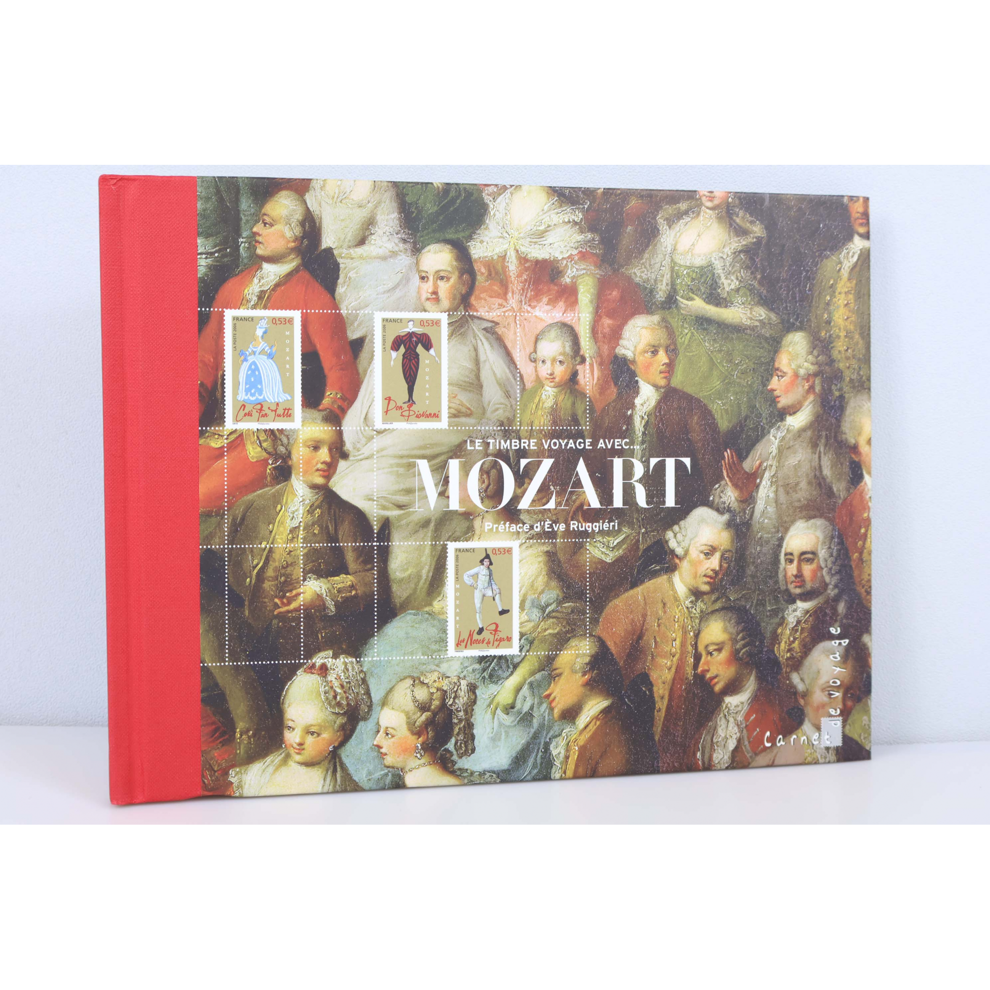LIVRE DES TIMBRES " LE TIMBRE VOYAGE AVEC MOZART " 2006 ANGLES LÉGÈREMENT ABIMÉS